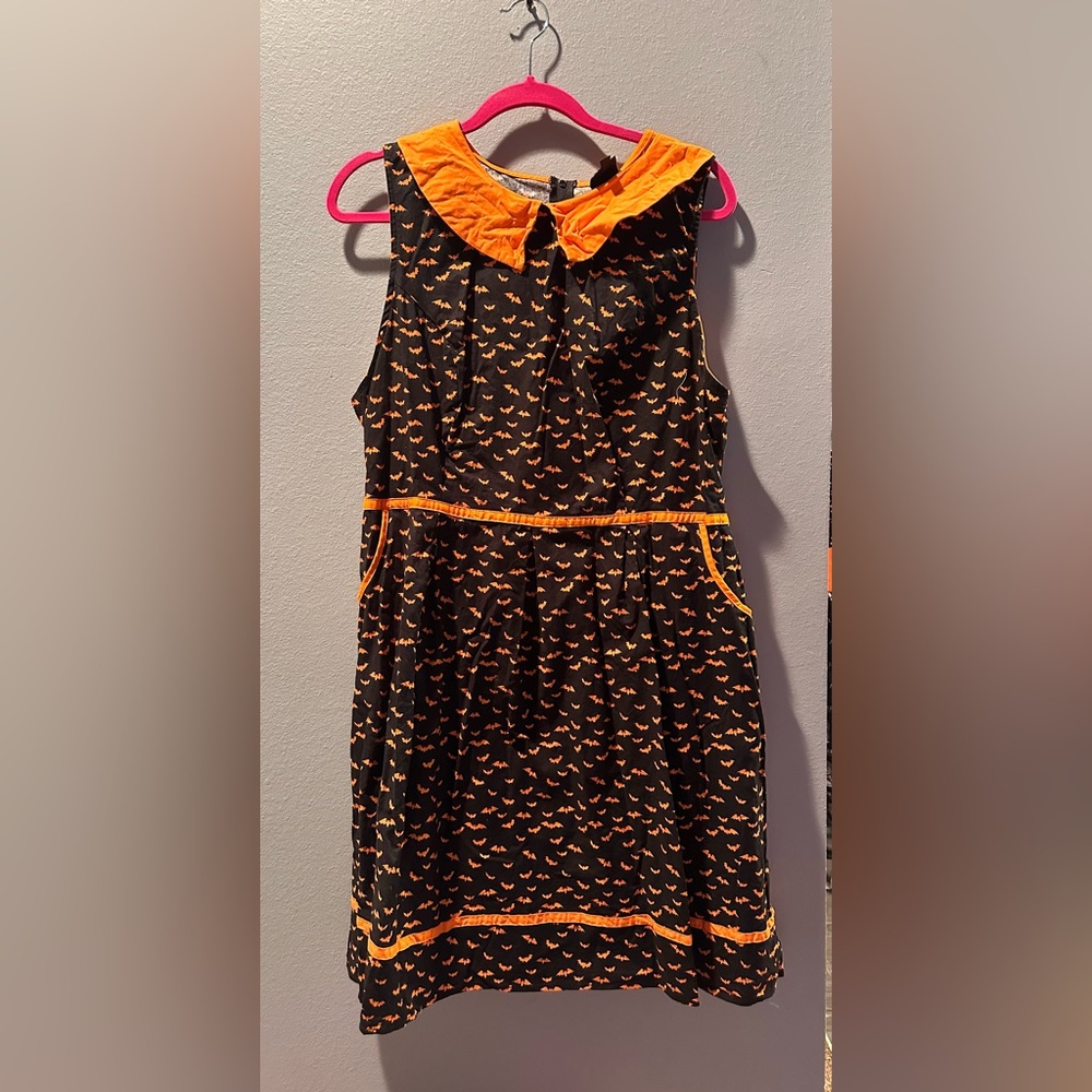 Retrolicious orange bat dress.